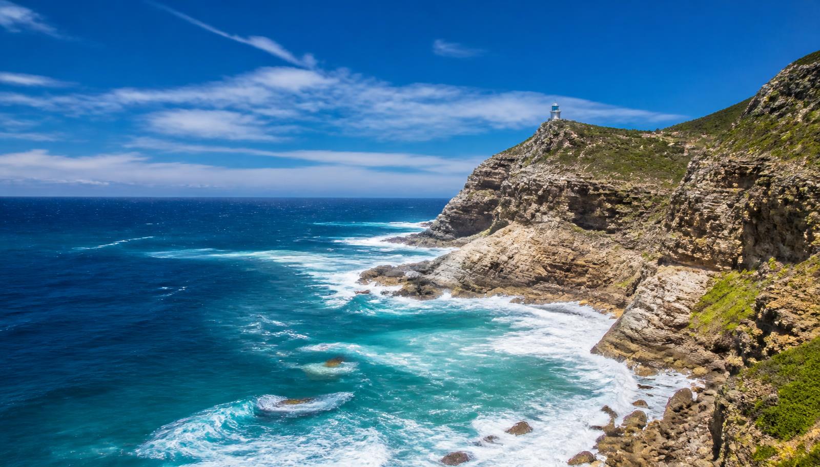 Cape of Good Hope, rocky cliffs and lighthouse above the Atlantic