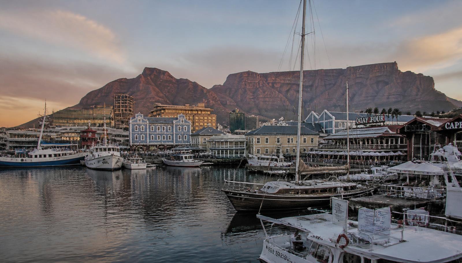 The V&A Waterfront harbour in Cape Town with Table Mountain behind it